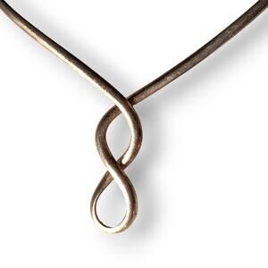 Silver tone infinity sign collar necklace
